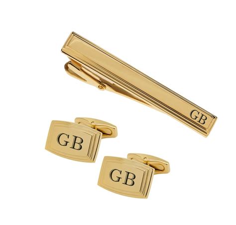 engraved tie clip and cufflinks.